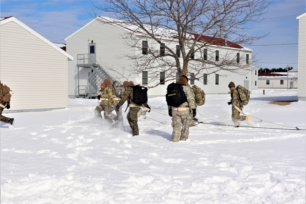 Fort McCoy CWOC Class 20-04 students practice pulling ahkio sled as a squad