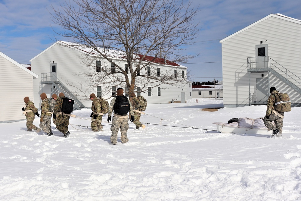 Fort McCoy CWOC Class 20-04 students practice pulling ahkio sled as a squad