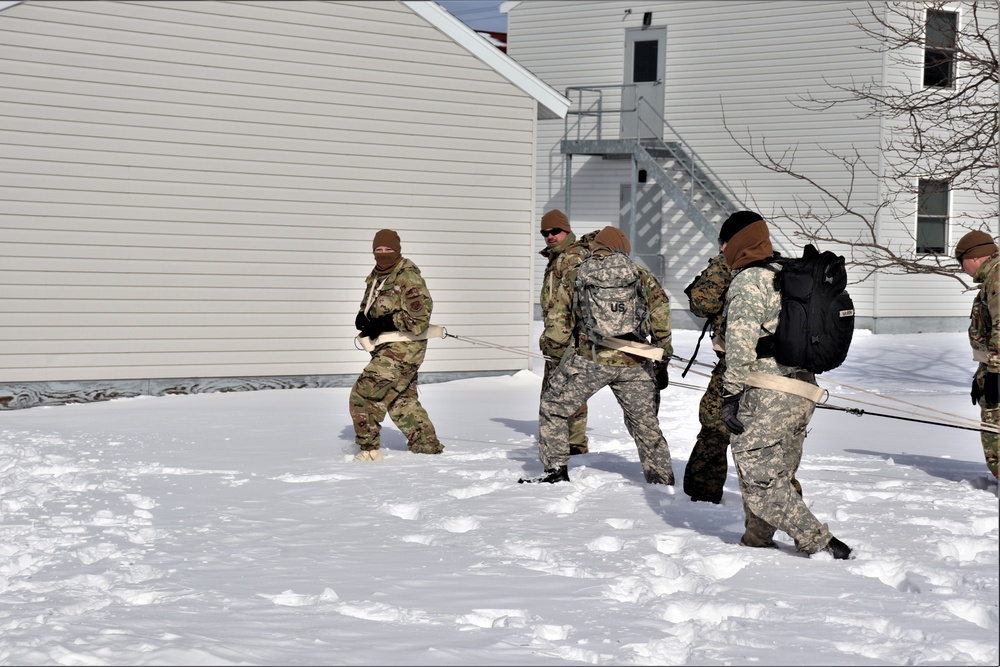 Fort McCoy CWOC Class 20-04 students practice pulling ahkio sled as a squad