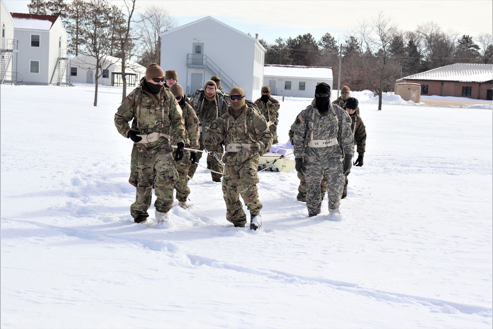 Fort McCoy CWOC Class 20-04 students practice pulling ahkio sled as a squad