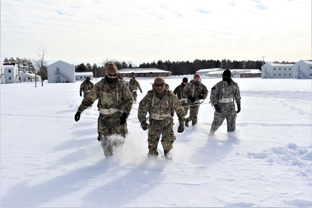 Fort McCoy CWOC Class 20-04 students practice pulling ahkio sled as a squad