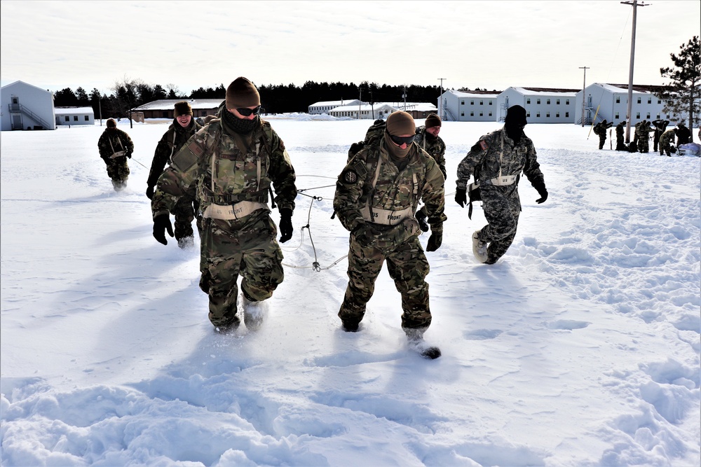 Fort McCoy CWOC Class 20-04 students practice pulling ahkio sled as a squad