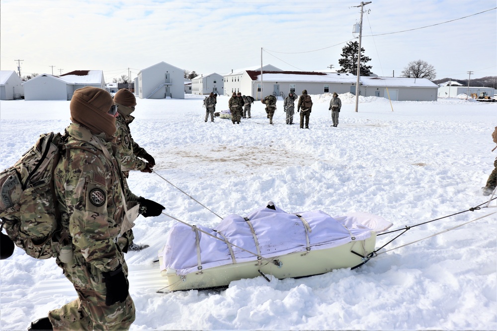 Fort McCoy CWOC Class 20-04 students practice pulling ahkio sled as a squad