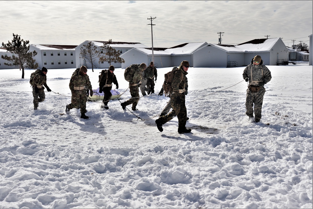 Fort McCoy CWOC Class 20-04 students practice pulling ahkio sled as a squad