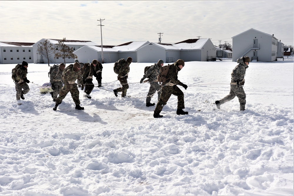 Fort McCoy CWOC Class 20-04 students practice pulling ahkio sled as a squad