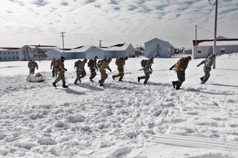 Fort McCoy CWOC Class 20-04 students practice pulling ahkio sled as a squad