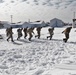 Fort McCoy CWOC Class 20-04 students practice pulling ahkio sled as a squad