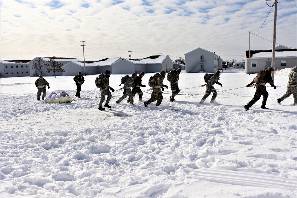 Fort McCoy CWOC Class 20-04 students practice pulling ahkio sled as a squad