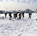 Fort McCoy CWOC Class 20-04 students practice pulling ahkio sled as a squad