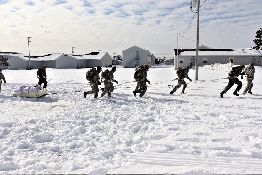 Fort McCoy CWOC Class 20-04 students practice pulling ahkio sled as a squad