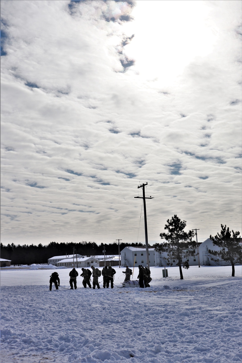 Fort McCoy CWOC Class 20-04 students practice pulling ahkio sled as a squad