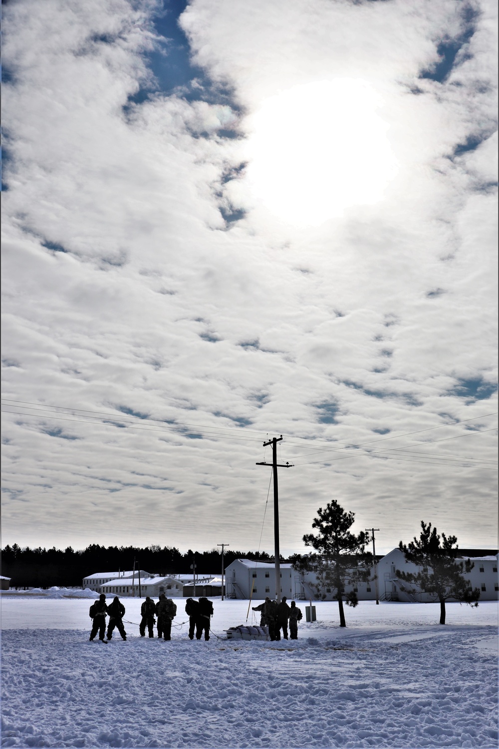 Fort McCoy CWOC Class 20-04 students practice pulling ahkio sled as a squad