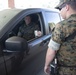 Camp Lejeune, MCAS New River gate sentries limit contact with identification cards at entry control points due to potential spread of COVID-19