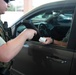 Camp Lejeune, MCAS New River gate sentries limit contact with identification cards at entry control points due to potential spread of COVID-19