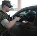 Camp Lejeune, MCAS New River gate sentries limit contact with identification cards at entry control points due to potential spread of COVID-19