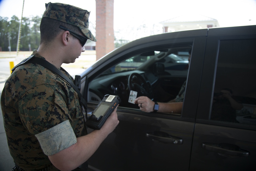 Camp Lejeune, MCAS New River gate sentries limit contact with identification cards at entry control points due to potential spread of COVID-19