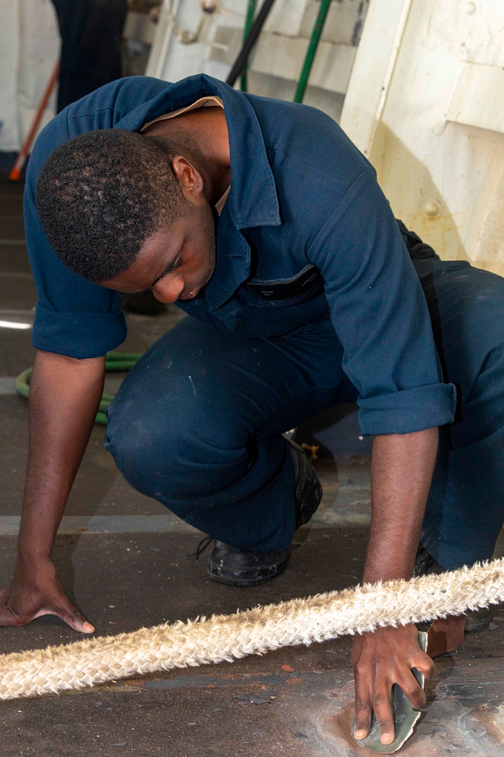 Sailors help to perserve a mooring station