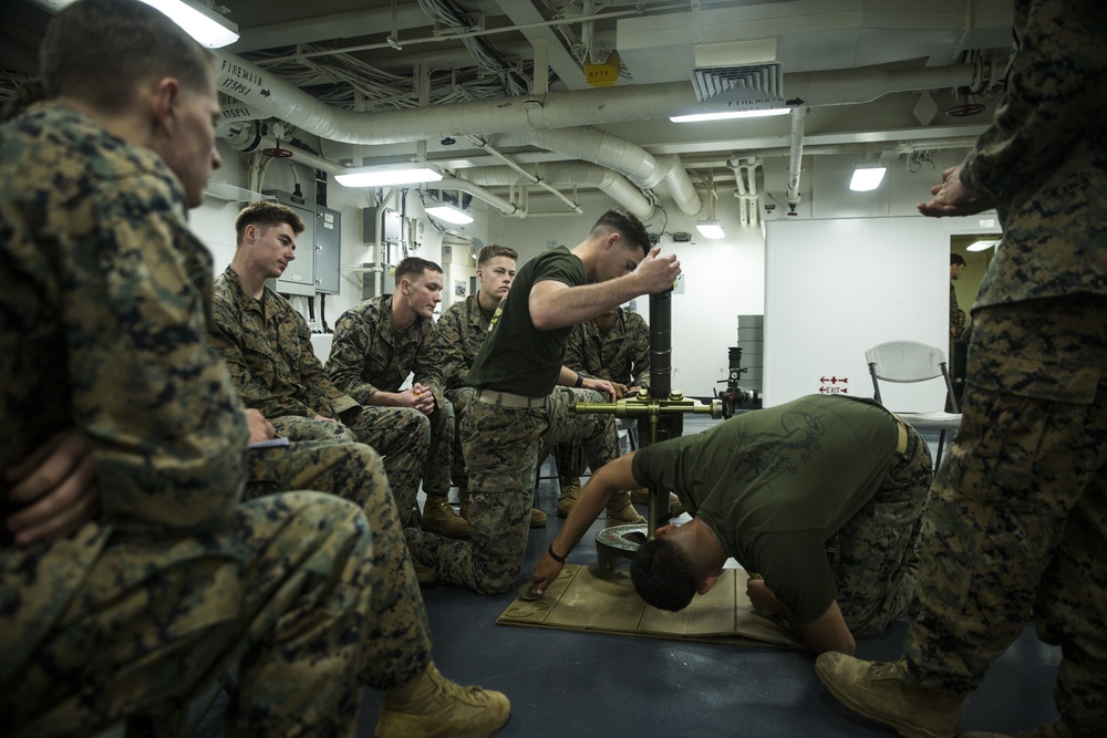 31st MEU Marines conduct 60mm mortars class aboard USS America