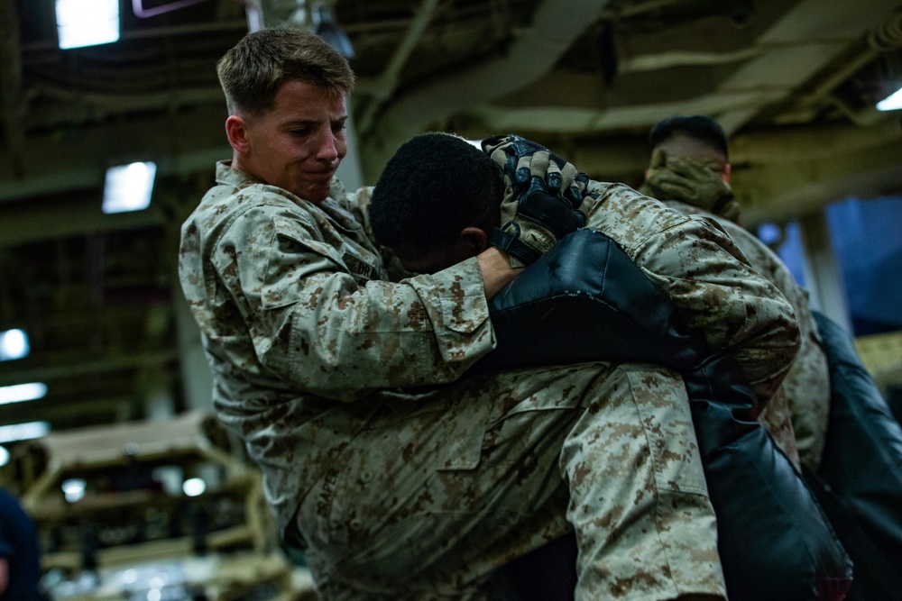 31st MEU Marines conduct MCMAP aboard USS America