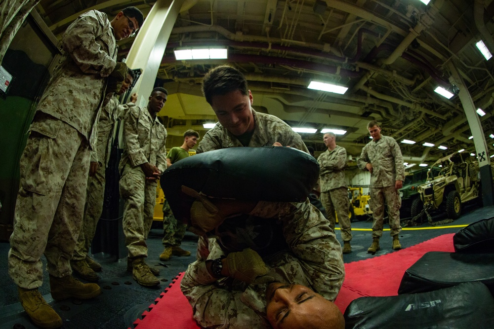 31st MEU Marines conduct MCMAP aboard USS America