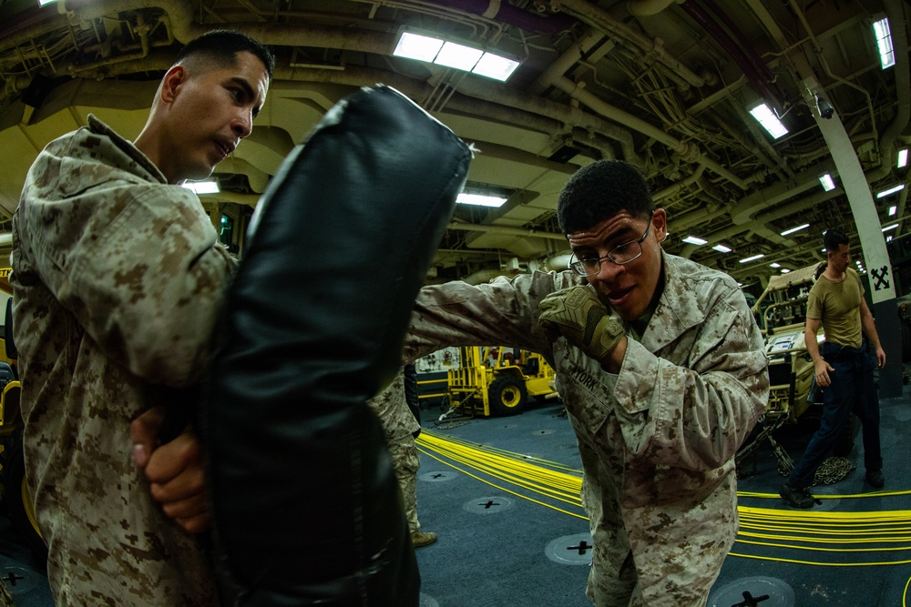 31st MEU Marines conduct MCMAP aboard USS America