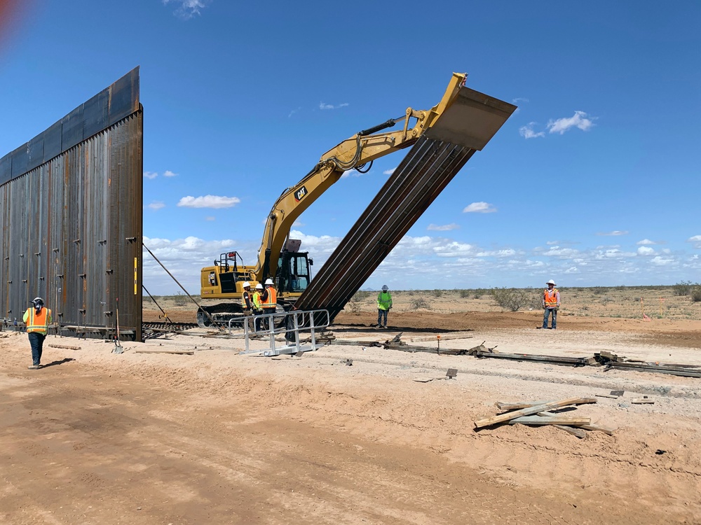 Crews install barrier panels at Barry M. Goldwater Reang