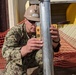 U.S. Navy Seabees with NMCB-5's Detail Atsugi construct a loading dock for the Navy Exchange