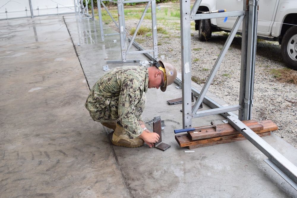 U.S. Navy Seabees from NMCB 5’s Detail Diego Garcia conduct high quality construction