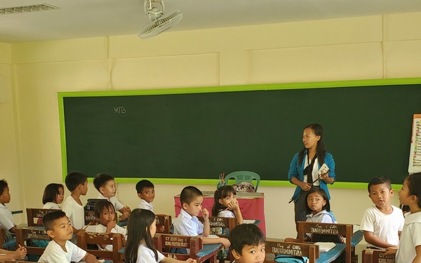 Local Palawan children in their new school built by U.S. Navy Seabees with NMCB-5