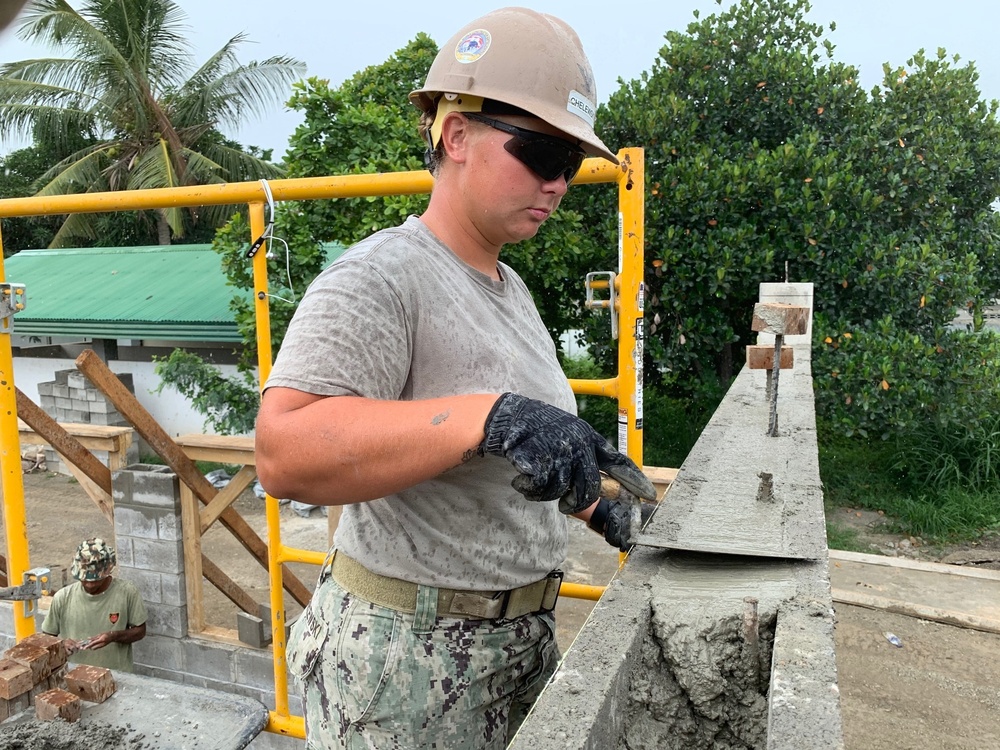 U.S. Navy Seabees with NMCB-5’s Detail Timor-Leste construct a two-room classroom