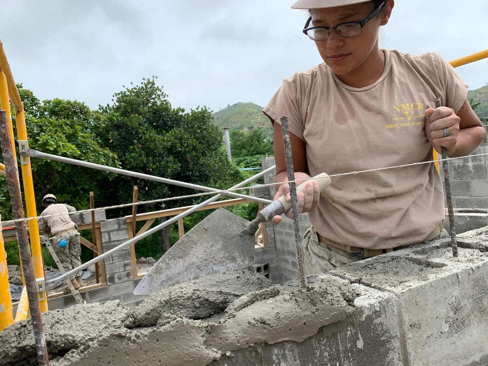 U.S. Navy Seabees with NMCB-5’s Detail Timor-Leste construct a two-room classroom