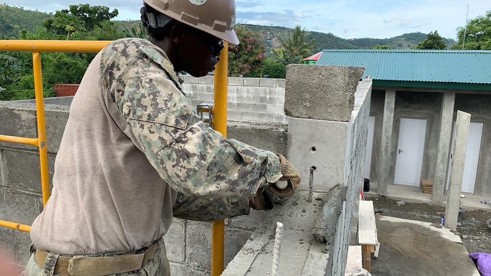 U.S. Navy Seabees with NMCB-5’s Detail Timor-Leste construct a two-room classroom