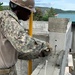 U.S. Navy Seabees with NMCB-5’s Detail Timor-Leste construct a two-room classroom