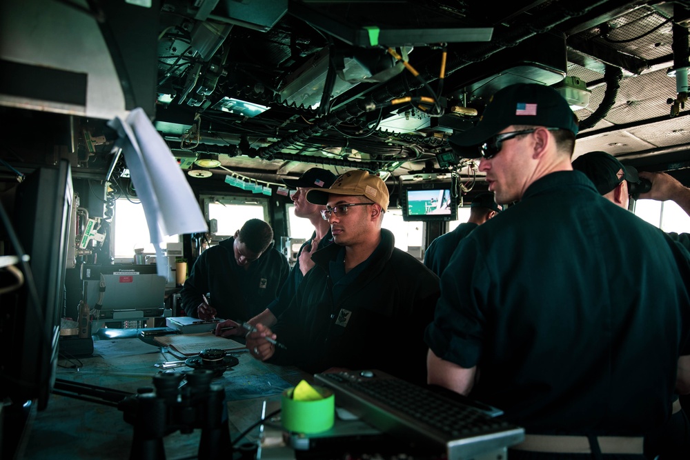 Sailors aboard the coastal patrol ship USS Tempest