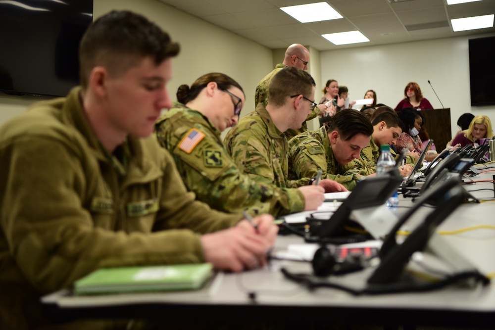 Soldiers answer phone calls about Covid-19