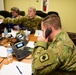 Soldiers answer phone calls about Covid-19