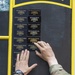 Chosin Rangers add their names to the wall