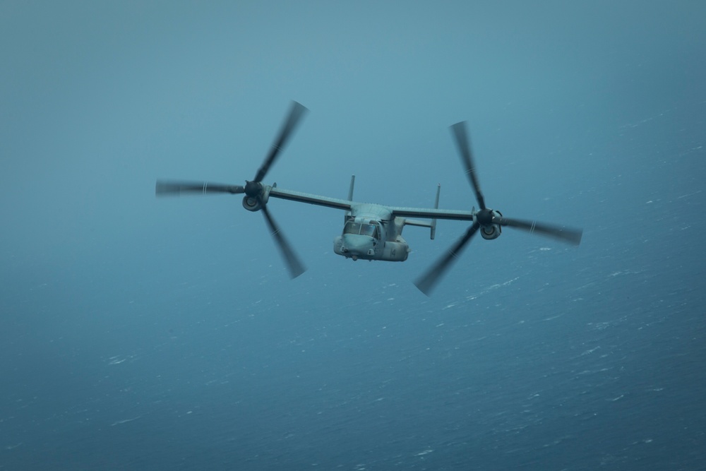 31st MEU Marines fly over USS America