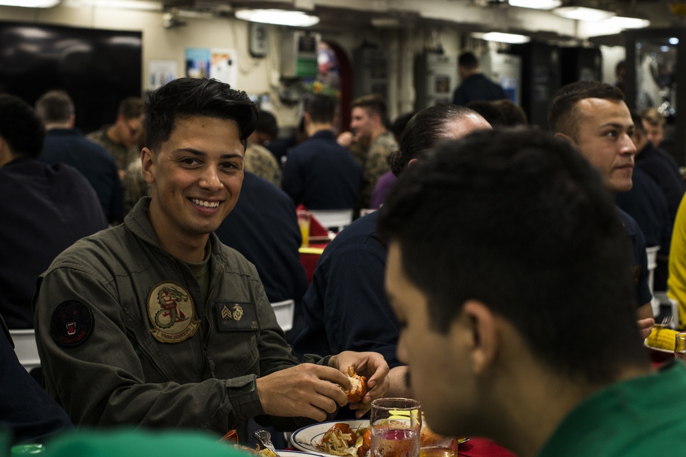 Marines, Sailors celebrate March and April Birthdays aboard USS America