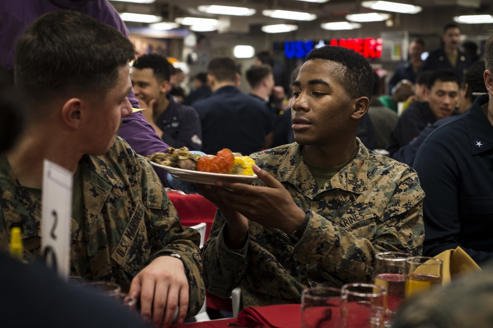 Marines, Sailors celebrate March and April Birthdays aboard USS America