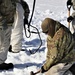 Cold-Weather Operations Course students practice building Arctic tent