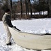 Cold-Weather Operations Course students practice building Arctic tent