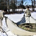 Cold-Weather Operations Course students practice building Arctic tent