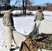 Cold-Weather Operations Course students practice building Arctic tent