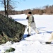 Cold-Weather Operations Course students practice building Arctic tent