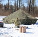 Cold-Weather Operations Course students practice building Arctic tent