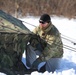 Cold-Weather Operations Course students practice building Arctic tent