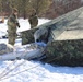 Cold-Weather Operations Course students practice building Arctic tent