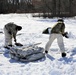 Cold-Weather Operations Course students practice building Arctic tent