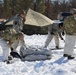 Cold-Weather Operations Course students practice building Arctic tent